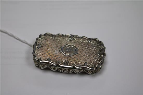 A Victorian engine turned silver vinaigrette (lacking grille), by Hilliard & Thomason, Birmingham, 1850, 55mm.